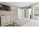 Comfortable bedroom features a dresser and closet access at 5905 S Kings Hwy. # 318B, Myrtle Beach, SC 29575