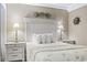 Comfortable bedroom features soft lighting and beach-themed decor at 5905 S Kings Hwy. # 318B, Myrtle Beach, SC 29575