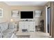 Inviting living room features a flat-screen TV and neutral decor, creating a relaxing atmosphere at 5905 S Kings Hwy. # 318B, Myrtle Beach, SC 29575