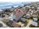 Aerial view of the property with the beach pier in the distance at 625 N Waccamaw Dr. # 102, Murrells Inlet, SC 29576