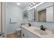 Bathroom featuring double vanity sinks and a mirrored cabinet at 625 N Waccamaw Dr. # 102, Murrells Inlet, SC 29576