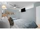 Spacious bedroom offering two beds, a TV, and ample natural light at 625 N Waccamaw Dr. # 102, Murrells Inlet, SC 29576