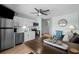 Bright, open kitchen with stainless steel appliances, offering both style and functionality for enjoyable cooking experiences at 625 N Waccamaw Dr. # 102, Murrells Inlet, SC 29576