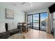 This is a comfortable living space featuring modern furnishings and a bright, airy atmosphere with views of the outdoors at 625 N Waccamaw Dr. # 102, Murrells Inlet, SC 29576