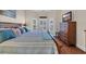 Comfortable bedroom featuring a TV, wooden floors, and a cozy bay window at 670 2Nd Ave. N, North Myrtle Beach, SC 29582