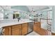 Bright, open layout showcasing the kitchen with stainless steel appliances connected to the living and dining areas at 670 2Nd Ave. N, North Myrtle Beach, SC 29582