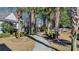 Beautiful paved path lined with trees in a quiet community at 670 2Nd Ave. N, North Myrtle Beach, SC 29582