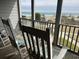 Screened in balcony with a view of the beach at 671 Norris Dr., Pawleys Island, SC 29585