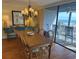 Bright dining room with a large window showcasing ocean views at 671 Norris Dr., Pawleys Island, SC 29585