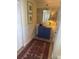 Hallway with blue dresser, and decorated walls at 671 Norris Dr., Pawleys Island, SC 29585