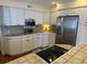 Bright, well-equipped kitchen with modern stainless steel appliances and ample counter space at 671 Norris Dr., Pawleys Island, SC 29585