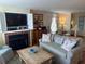 Comfortable living room with a fireplace, tv, and stylish decor at 671 Norris Dr., Pawleys Island, SC 29585