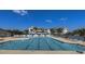 Large community pool, perfect for swimming and relaxing by the water with palm trees and lots of seating at 671 Norris Dr., Pawleys Island, SC 29585