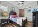 Comfortable bedroom with wood floors and barn door at 6892 Belancino Blvd., Myrtle Beach, SC 29572