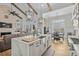 Modern kitchen featuring a large island, stainless steel appliances, and an open layout at 6892 Belancino Blvd., Myrtle Beach, SC 29572