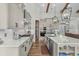 Contemporary kitchen with stainless steel appliances, a center island, and sleek countertops at 6892 Belancino Blvd., Myrtle Beach, SC 29572