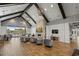 Spacious lounge area with vaulted ceilings, fireplace, and comfortable seating at 6892 Belancino Blvd., Myrtle Beach, SC 29572