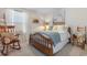 Charming bedroom featuring vintage decor, cozy bedding, and ample natural light at 706 Gryffindor Dr., Little River, SC 29566