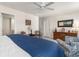 Relaxing bedroom with a large bed, natural light, and comfortable seating area at 706 Gryffindor Dr., Little River, SC 29566
