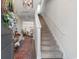 Bright foyer featuring staircase, wood floors, and a view of the dining area at 706 Gryffindor Dr., Little River, SC 29566