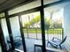 View of a balcony with outdoor seating, offering an inviting outdoor relaxation space at 7200 N Ocean Blvd. # 136, Myrtle Beach, SC 29572