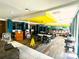 Open and airy restaurant space with modern decor, comfortable seating, and a lively bar area at 7200 N Ocean Blvd. # 136, Myrtle Beach, SC 29572