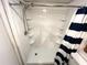 Clean shower stall with convenient shelving and a modern showerhead at 7200 N Ocean Blvd. # 136, Myrtle Beach, SC 29572