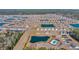 Panoramic aerial view of a Primary-planned community featuring homes, ponds and community amenities at 738 Harrison Mill St., Myrtle Beach, SC 29579