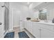 Bathroom featuring double sinks, tiled shower, and spacious vanity at 738 Harrison Mill St., Myrtle Beach, SC 29579