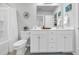 Bright bathroom with a toilet and double vanity with chrome fixtures at 738 Harrison Mill St., Myrtle Beach, SC 29579
