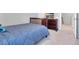 A cozy bedroom features a crib, a television, and a dresser, all set in a peaceful environment at 738 Harrison Mill St., Myrtle Beach, SC 29579