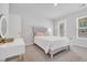 Bright bedroom featuring a vanity with light-up mirror and a sliding door to a balcony at 738 Harrison Mill St., Myrtle Beach, SC 29579