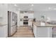 Bright kitchen featuring stainless steel appliances, granite countertops, and a breakfast bar with an open layout at 738 Harrison Mill St., Myrtle Beach, SC 29579