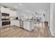 Bright, open kitchen with stainless steel appliances, granite countertops, and hardwood floors at 738 Harrison Mill St., Myrtle Beach, SC 29579