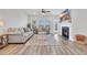 Inviting living room with a cozy fireplace, neutral furniture, and lots of light at 738 Harrison Mill St., Myrtle Beach, SC 29579