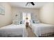 Cozy bedroom featuring two twin beds, nautical decor, and a ceiling fan at 768 Satterwhite Way, Myrtle Beach, SC 29577