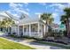 Inviting home featuring a spacious front porch, manicured landscaping, and a charming neighborhood setting at 768 Satterwhite Way, Myrtle Beach, SC 29577