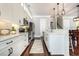 Modern kitchen with white cabinets, stainless steel appliances, and a breakfast bar at 768 Satterwhite Way, Myrtle Beach, SC 29577