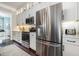 Modern kitchen with stainless steel appliances, white cabinets, and white quartz countertops at 768 Satterwhite Way, Myrtle Beach, SC 29577