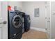 Modern laundry room with front-load washer and dryer at 768 Satterwhite Way, Myrtle Beach, SC 29577