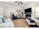 Bright living room with fireplace, hardwood floors, and comfortable seating at 768 Satterwhite Way, Myrtle Beach, SC 29577