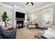 Cozy living room with fireplace, hardwood floors, and comfortable seating at 768 Satterwhite Way, Myrtle Beach, SC 29577