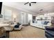 Open living room and kitchen area with hardwood floors and contemporary furnishings at 768 Satterwhite Way, Myrtle Beach, SC 29577