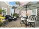 Charming patio with outdoor seating and a grill at 768 Satterwhite Way, Myrtle Beach, SC 29577