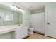 Clean bathroom featuring a vanity, toilet, and shower with a curtain at 813 Starboard Ct., Murrells Inlet, SC 29576