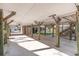 Spacious carport with visible support beams and access to the home's entrance and outdoor space at 813 Starboard Ct., Murrells Inlet, SC 29576