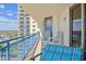 Inviting balcony with comfortable seating and a view of the ocean and building at 8560 Queensway Blvd. # 1206, Myrtle Beach, SC 29572