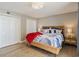 Bedroom with closet, lamps, and balcony access to enjoy views at 8560 Queensway Blvd. # 1206, Myrtle Beach, SC 29572