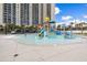 Gathering-friendly water park area with slides, splash pads, and cabanas at 8560 Queensway Blvd. # 1206, Myrtle Beach, SC 29572