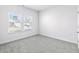 Neutral bedroom with carpet, two windows allowing ample natural light at 8704 High Banks Way, Longs, SC 29568